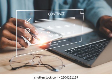 Electronic Signing Businessman Sign Electronic Documents On Digital Documents On Virtual Screen. Electronic Signature Concept