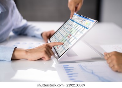 Electronic Spreadsheet Analyst Or Auditor Using Software On Hybrid Laptop