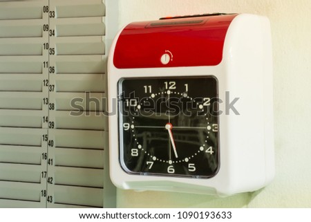 Electronic time recorder By inserting a card.