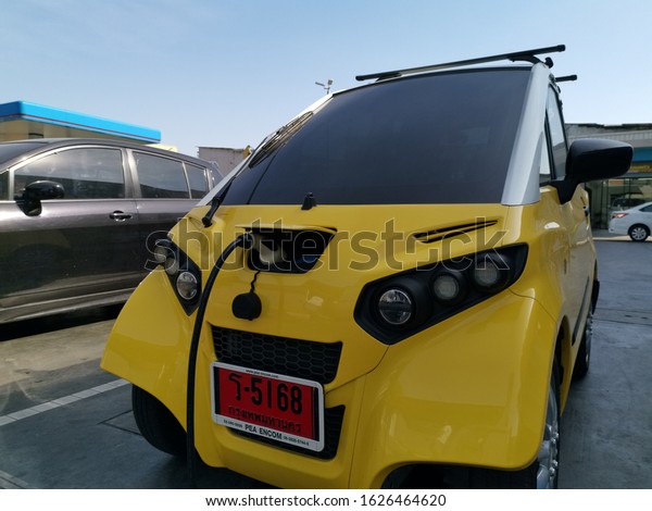 electronic vehicle is charging battery in\
gas station BANGALKOK THAILAND JANUARY\
2020