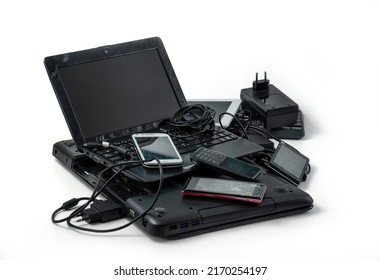 Electronic Waste Ready To Recycle, Isolated On White Background.  Pile Of Mixed Electronic Waste, Old Broken Computer Parts, Laptops, Cell Phones