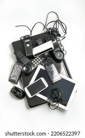 Electronic Waste Ready To Recycle, Isolated On White Background.  Pile Of Mixed Electronic Waste, Old Broken Computer Parts, Laptops, Cell Phones