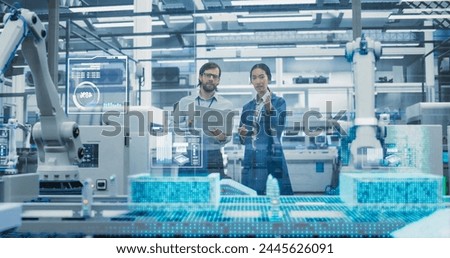 Electronics Factory Assembly Line Digitalization: Automated Robot Arms Manufacturing Advanced Equipment. Managers Discussing Work while Futuristic AI Computer Vision Analyzing, Scanning Conveyor Line