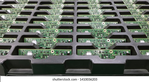 Electronics Manufacturing Services, Assembly Of Circuit Board Arrangement, Close-up Of The Raw Of PCBA In Tray.