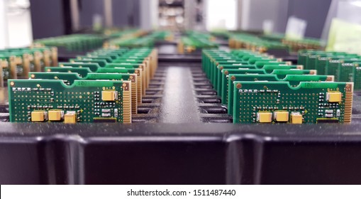 Electronics Manufacturing Services, Assembly Of Circuit Board Arrangement, Close-up Of The Raw Of PCBA In Tray.