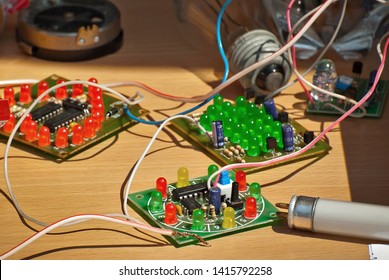 Electronics and robotics of handmade. Microcircuits, LEDs and colored wires close up. Electronic devices and mechanisms are presented at the scientific exhibition.