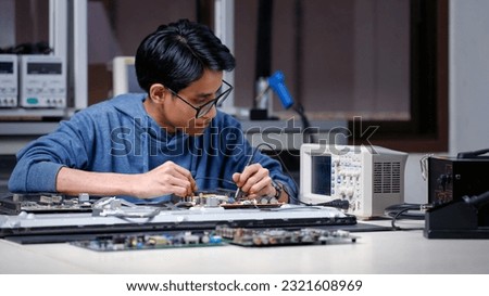 Electronics technician, electronic engineering electronic repair,electronics measuring and testing, repair and maintenance concepts.