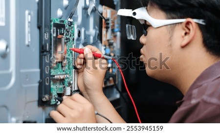 Electronics technician, electronic engineering electronic repair,electronics measuring and testing, repair and maintenance concepts.