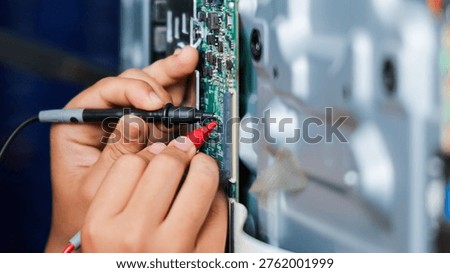 Electronics technician, electronic engineering electronic repair,electronics measuring and testing, repair and maintenance concepts.