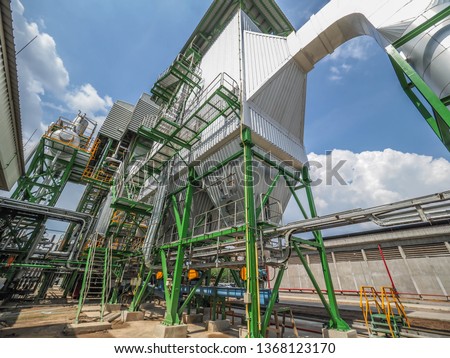 An electrostatic precipitator and stack in biomass power plant.