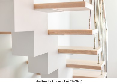 Elegance Contemporary Designed Stairs In A White Modern Room Of Luxury Apartment Interior. No People, Natural Lighting.