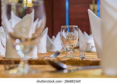 Elegance Of Glasses On Table Set Up For Dinning Room.