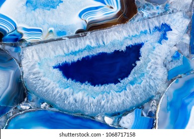 Elegant agate texture in delightful blue colour surface. High resolution photo.