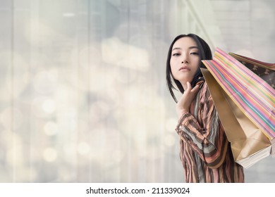 Elegant Asian Woman Shopping, Closeup Portrait.