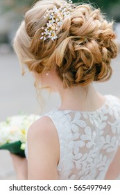 Elegant Blond Bride Standing Back With Collected Up Do Hair. Tender Wedding Stylish Hairstyle With Accessories. Fine Art Wedding. Light Bridal Morning Preparation.