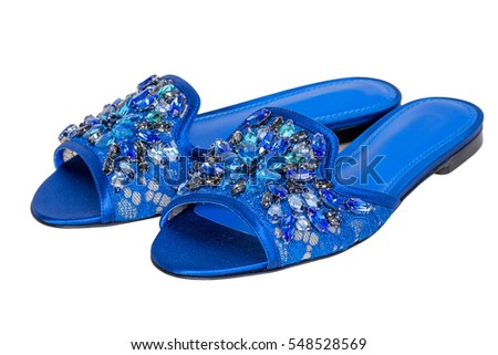 Elegant blue flat shoes for women with rhinestones stones isolated on white