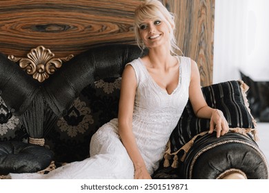 Elegant bride in a beautiful white dress sitting on a stylish sofa in a luxurious interior, smiling and looking happy. - Powered by Shutterstock