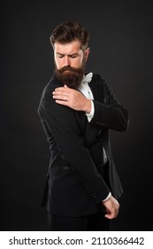 Elegant Butler Has Dandruff On Tuxedo On Black Background, Elegance