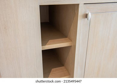 Elegant Cabinet Of Wood With Empty Shelves. Close Up.