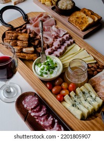 Elegant Charcuterie Board With Snacks ,cheese And Wine To Share With Many People