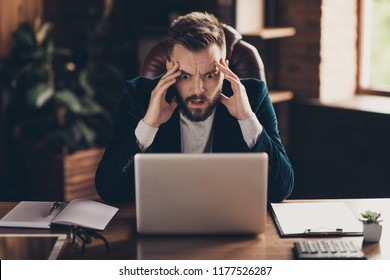 Elegant classic smart clever bearded sad furious handsome attractive depressed boss jacket, reading financial start-up report in laptop at modern workplace, workstation. Loser, chaos, bankrupt, crisis