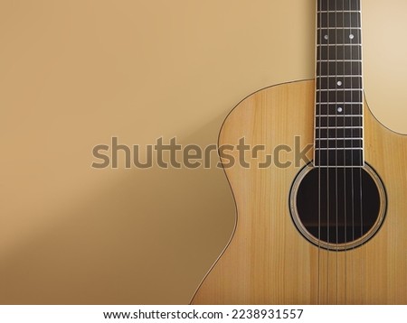 elegant classical guitar with shadow on the wall
