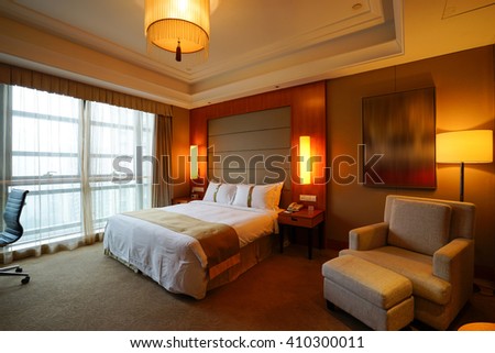 Elegant and comfortable home & hotel bedroom interior.