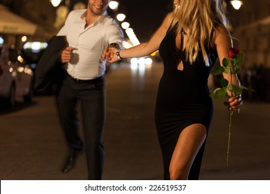 https://image.shutterstock.com/image-photo/elegant-couple-holding-hands-when-260nw-226519537.jpg