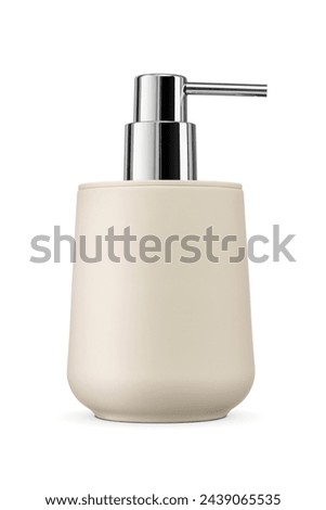 Elegant cream-colored ceramic soap dispenser with chrome pump isolated on white background. Modern bathroom accessory.