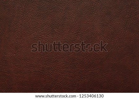 Elegant dark brown leatherette background. Dermantin texture. Free space for text.