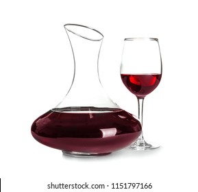 Elegant decanter and glass with red wine on white background