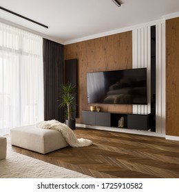 Elegant Designed Living Room With Big Television Screen, Wooden Floor And Wall