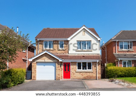 Elegant english house with red door