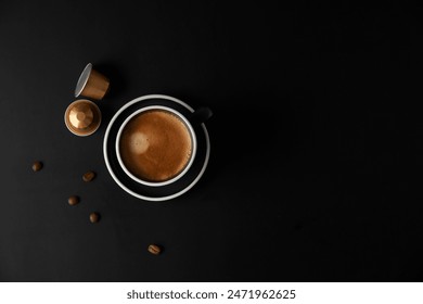 Elegant Espresso Cup with Coffee Capsule on Dark Background - Powered by Shutterstock