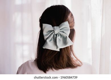 
Elegant Fashion Design Accessories For Girls. Hair Bow On Young Woman Hair