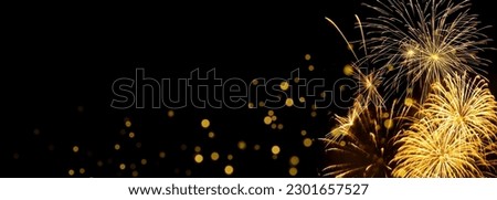 Elegant gold and black background with fireworks and light sparkles. Background for birthday celebrations, big events, congratulations and holidays like 4th of July or New Year's Eve