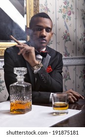 Elegant, Handsome Black Man Enjoy Whiskey And Cigar In The Club