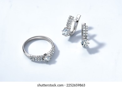 Elegant jewelry set. Jewellery set with gemstones. Jewelry accessories collage. Product still life concept. Ring, necklace and earrings. - Shutterstock ID 2252659863