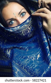 Elegant Lady With Blue Eye Lens In Traditional Indian Sari