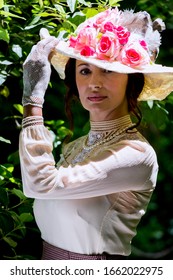 Elegant Lady, From High Society Of The Twentieth Century, Walking Through A Public Park
