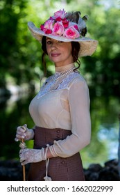 Elegant Lady, From High Society Of The Twentieth Century, Walking Through A Public Park
