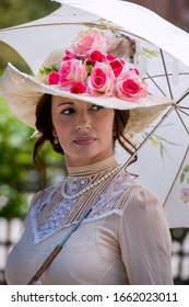 Elegant Lady, From High Society Of The Twentieth Century, Walking Through A Public Park
