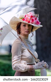 Elegant Lady, From High Society Of The Twentieth Century, Walking Through A Public Park
