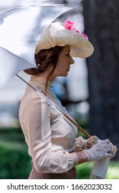 Elegant Lady, From High Society Of The Twentieth Century, Walking Through A Public Park
