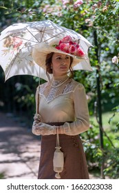 Elegant Lady, From High Society Of The Twentieth Century, Walking Through A Public Park
