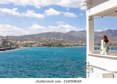 Elegant Lady Tourist Enjoying Summer Holiday. Vacation Travel In Greece, Agios Nikolaos.