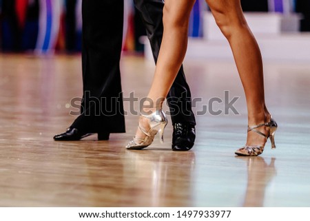 elegant legs dancers man and woman on dance floor