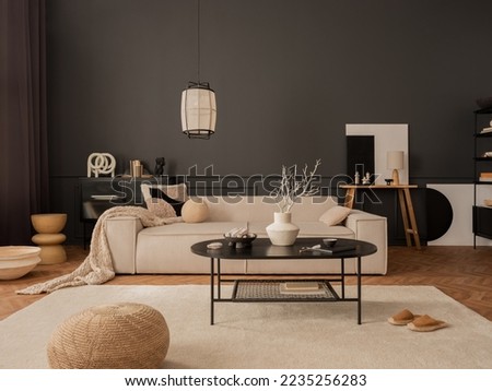 Elegant living room interior with mock up poster frame, modular sofa, black coffee table, rug, pouf, lamp, pillows, wooden bench, vase with dried flowers and personal accessories. Home decor. Template