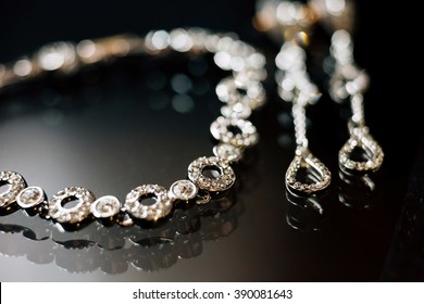 Elegant luxury bridal jewelries on dark background. Wedding details
