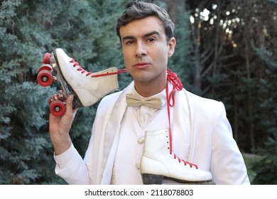 Elegant Male Roller Skater Wearing White Suit